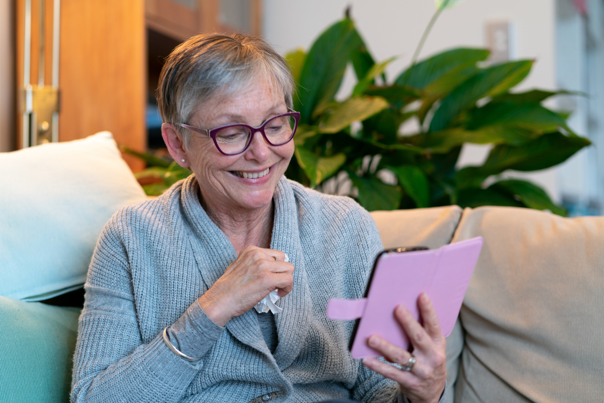 Senior woman engaged in telehealth